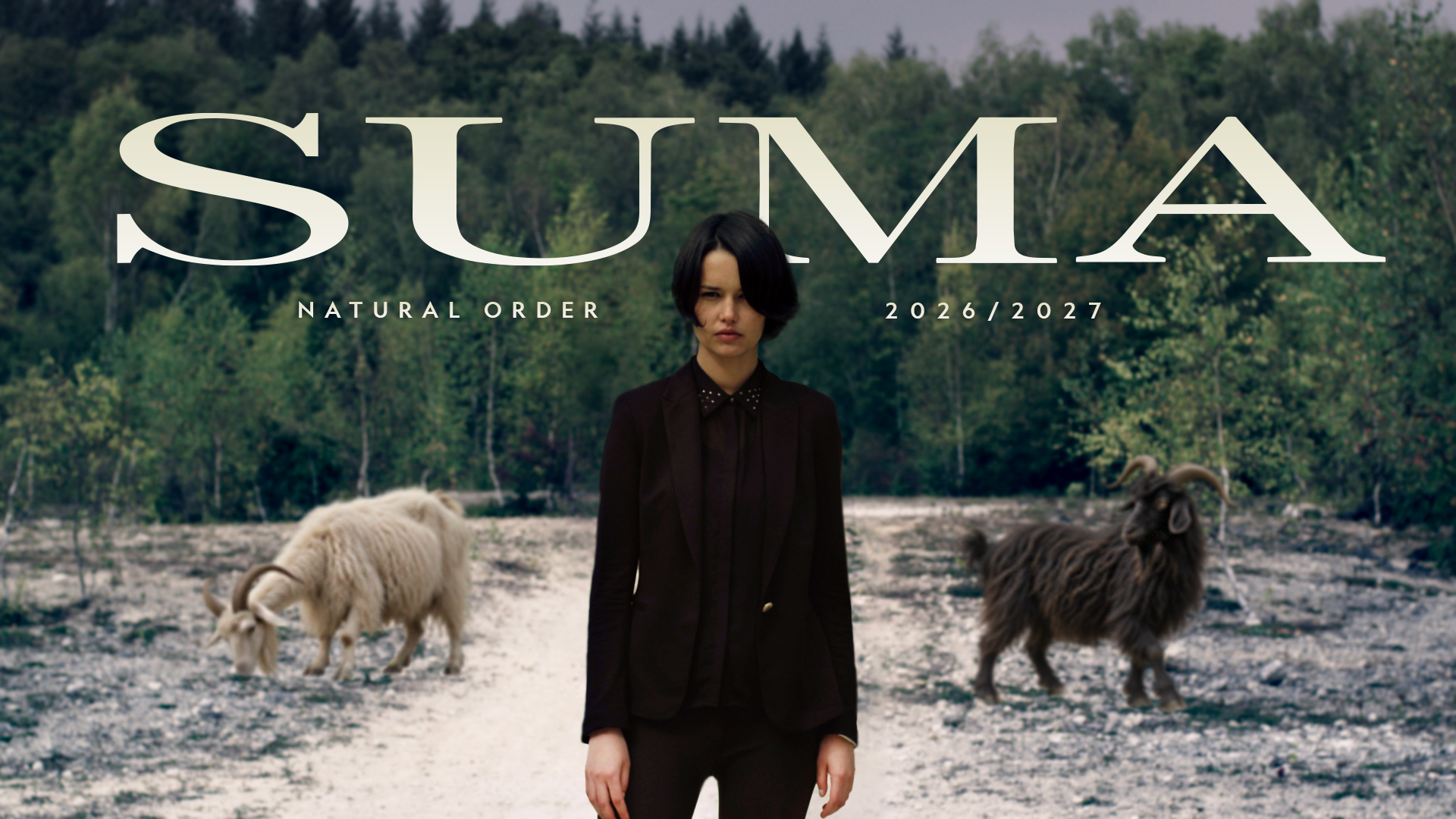 SUMA Natural Order campaign: tailored figure and goats in a forest
